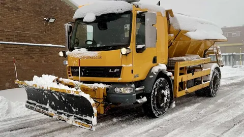 Gritting truck clearing snow and gritting in Yorkshire