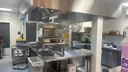 Pest monitoring equipment installed within the kitchen to help protect food preparation areas from rodents and insects.